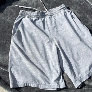 Mens Lululemon athletic shorts size medium. Heather gray.